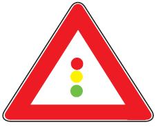 Çka paralajmëron kjo shenjë e trafikut?