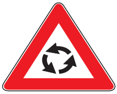 Çka paralajmëron kjo shenjë e trafikut?